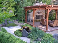 Japanese garden with fireplace, deck and arbor