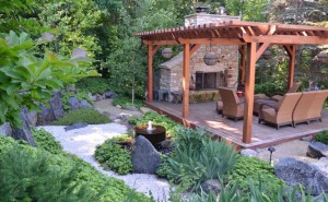 Japanese garden with fireplace, deck and arbor