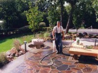 Flagstone Walk with Mill Stone Garden Feature